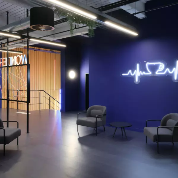 Bespoke neon lighting compliments purple walls at Bionic