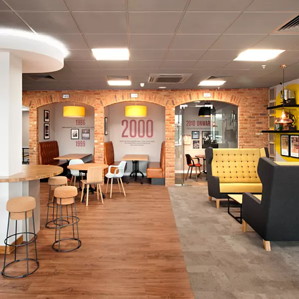 Booth seating and company branding at Costas Basildon office