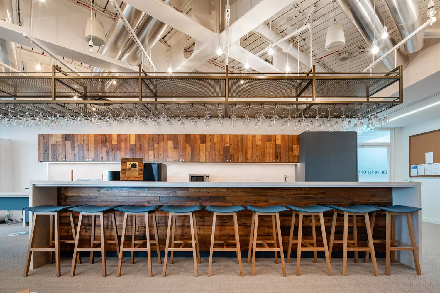 Timber finish island unit on Generation Investment Management teapoint