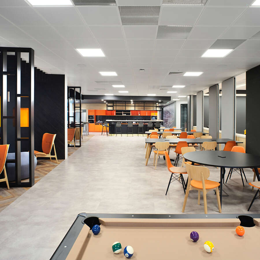Open plan collaborative office with pool table