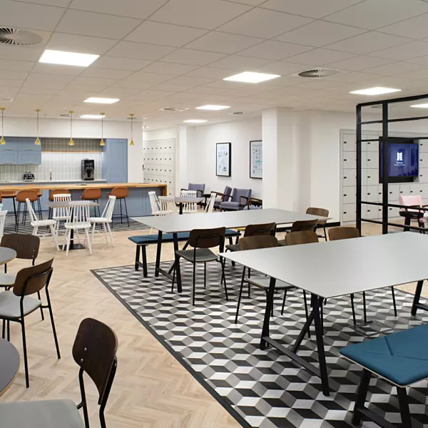 A variety of softly furnished touchdown zones complimented a timber herringbone floor