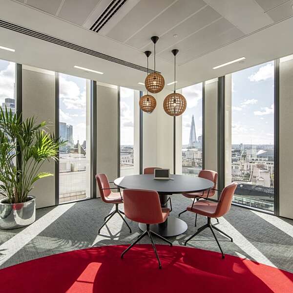 R3 red meeting room with natural light