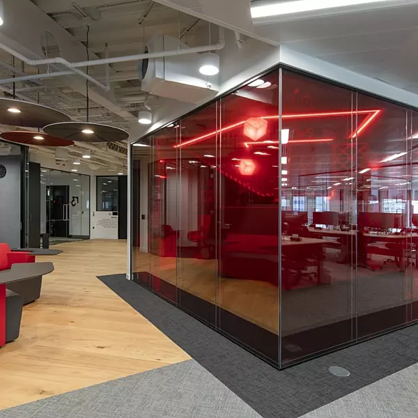 Red glass walls in modern office interior design