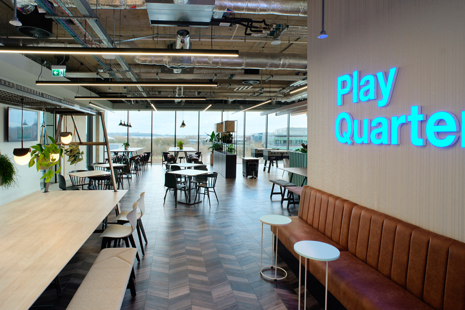 Exposed ceilings add depth to modern open plan office space at Three