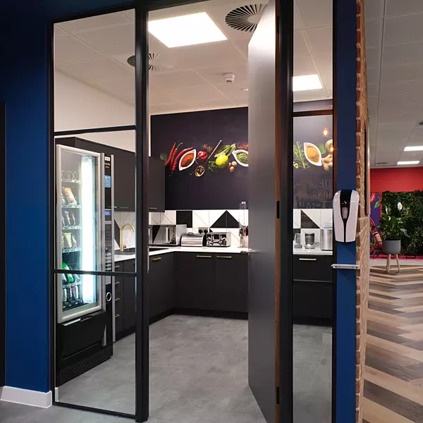 black and blue entrance to kitchen space