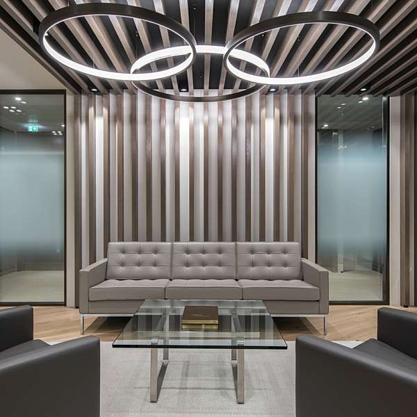 Office waiting area fit out with suspended lighting