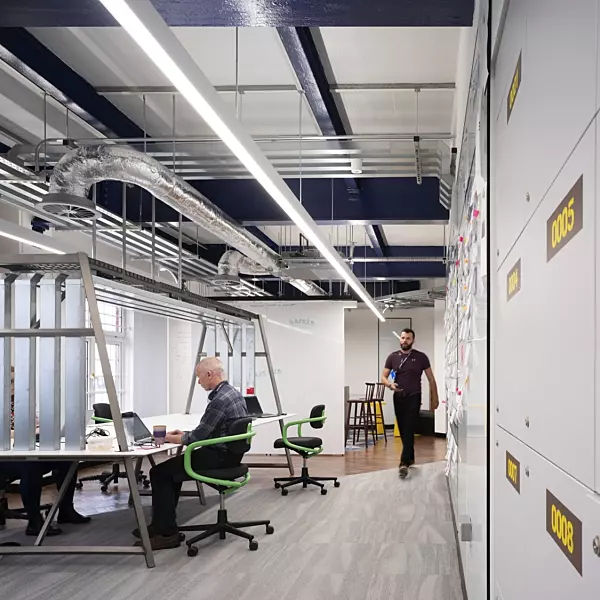 Royal Navy open plan office design with exposed services