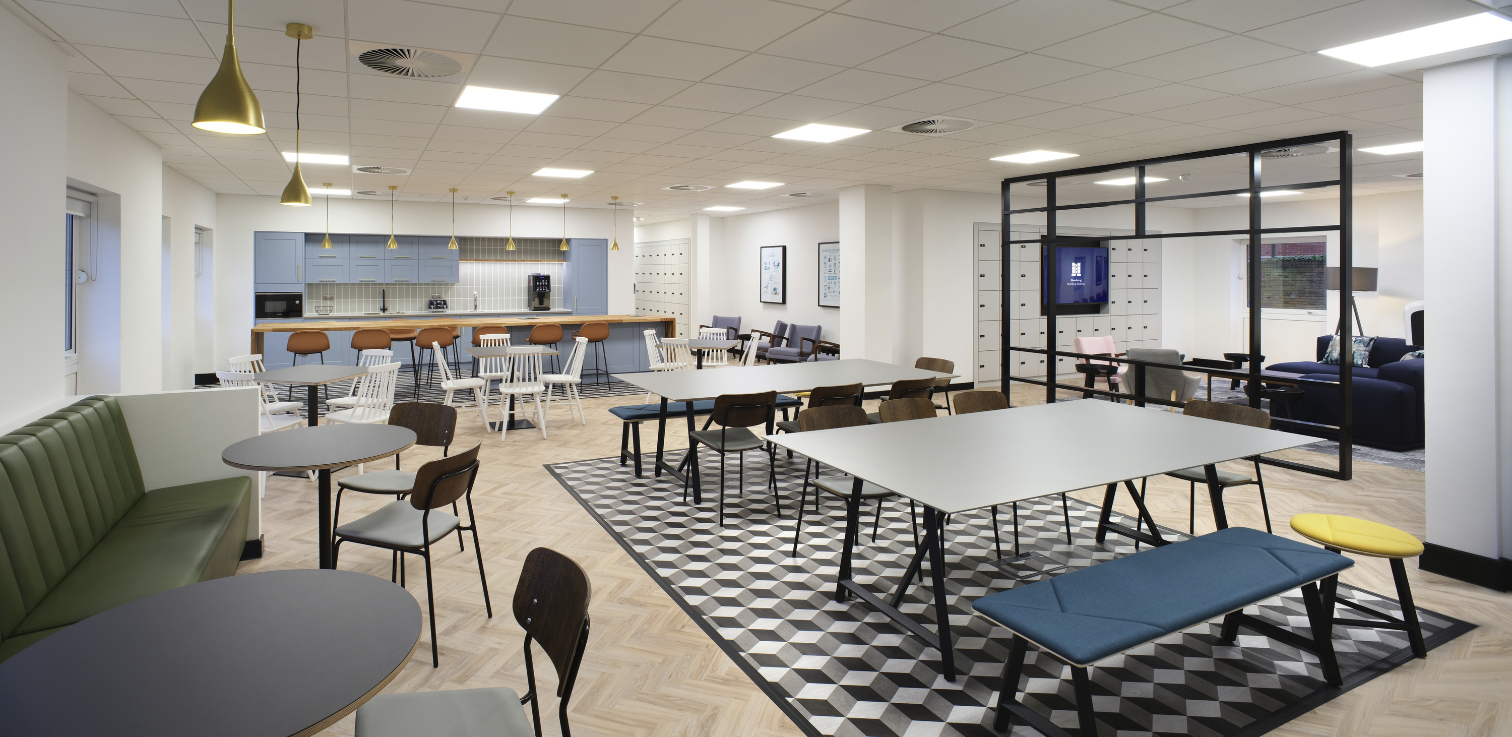 A variety of softly furnished touchdown zones complimented a timber herringbone floor