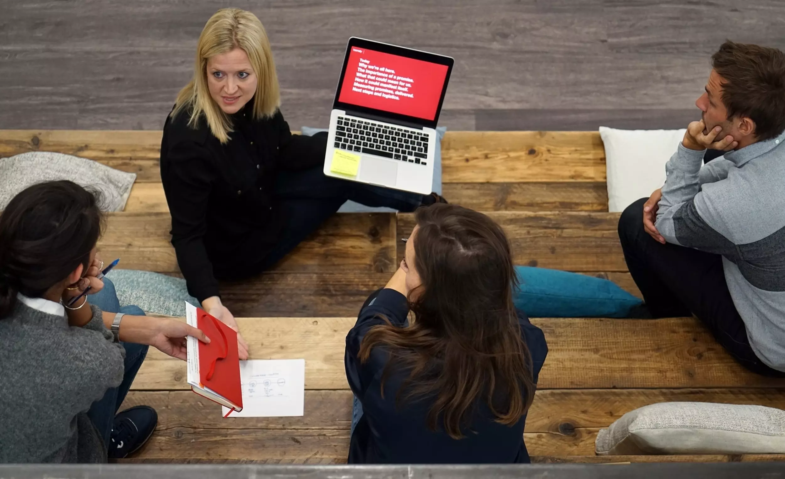 Employees working on bleacher seating