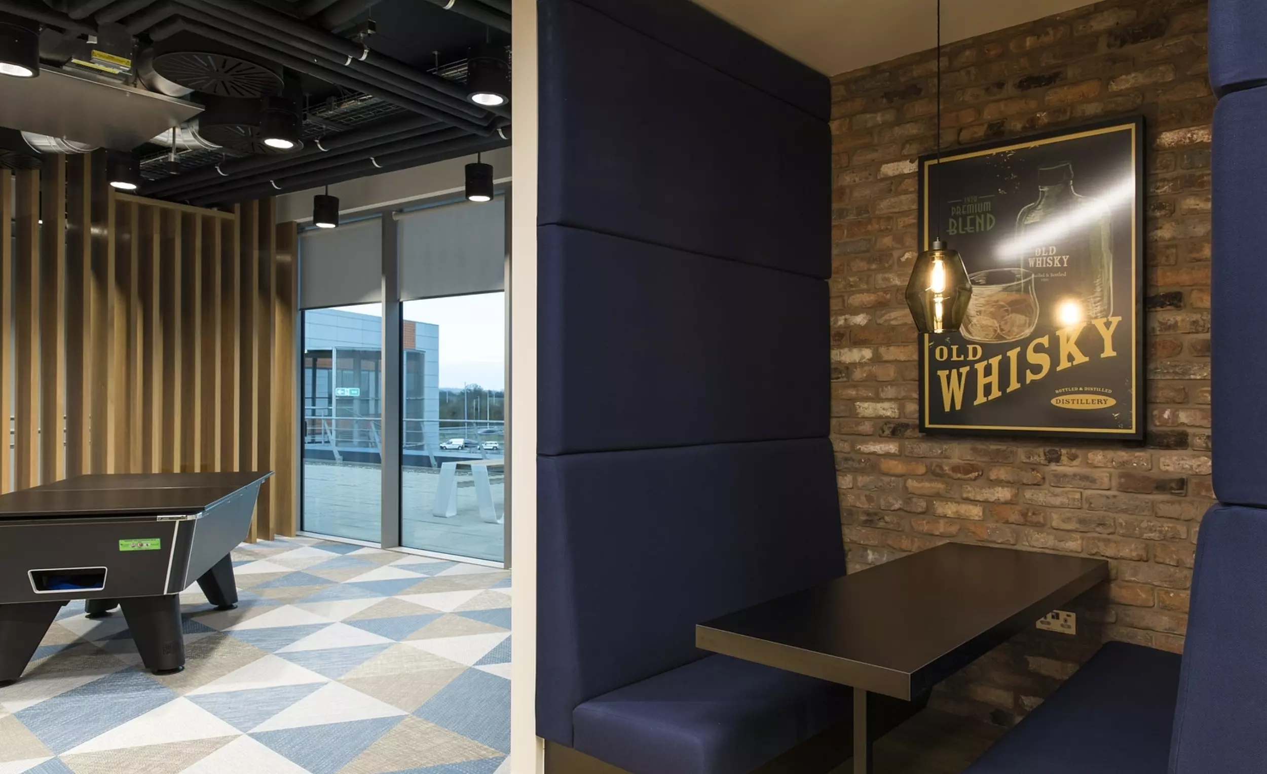 Trendy breakout space with a pool table