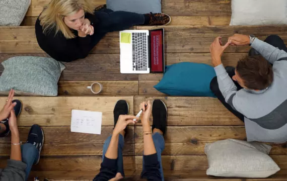Employees working on bleacher seating