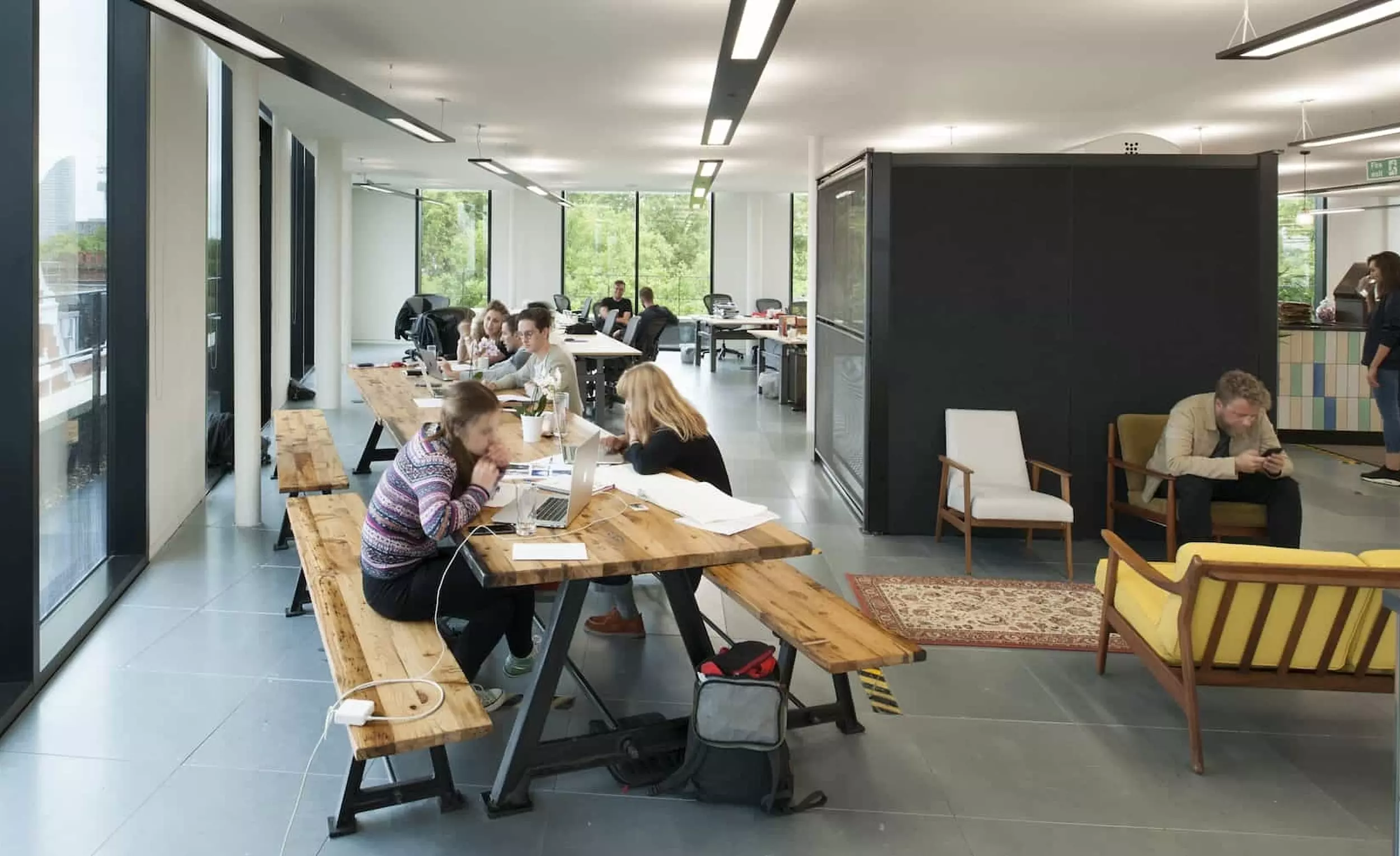 Staff collaborating in balanced workplace