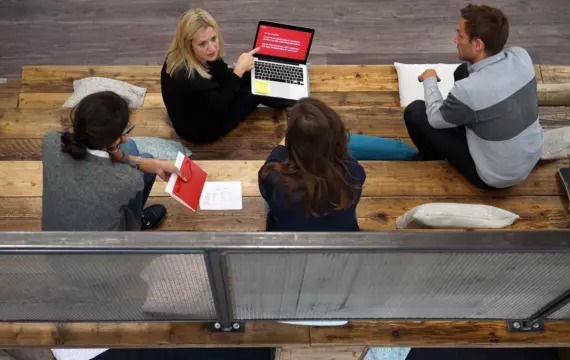 Employees working on bleacher seating