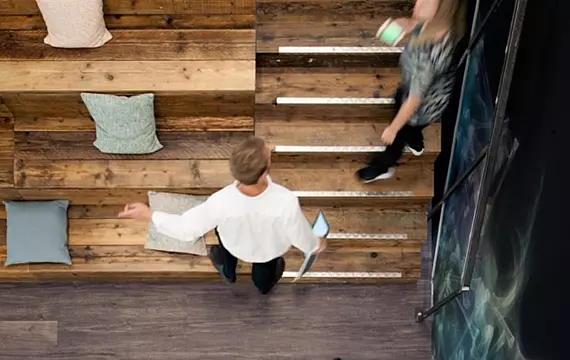 Trendy bleacher style seating at Anomaly