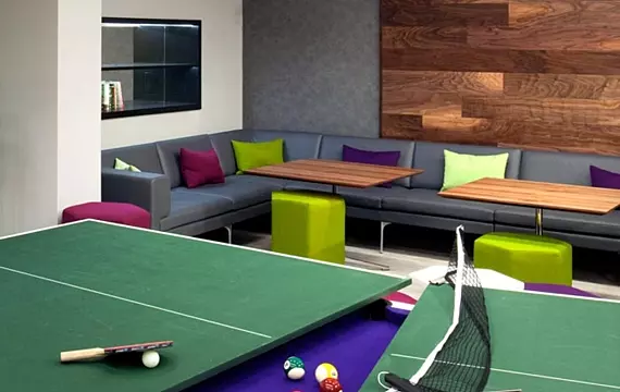 Trendy breakout space with a flexible games table