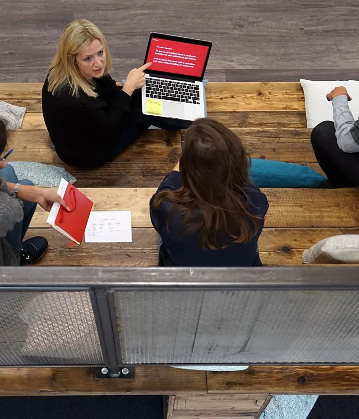 Employees working on bleacher seating