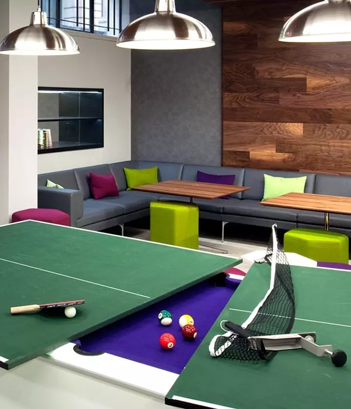 Trendy breakout space with a flexible games table