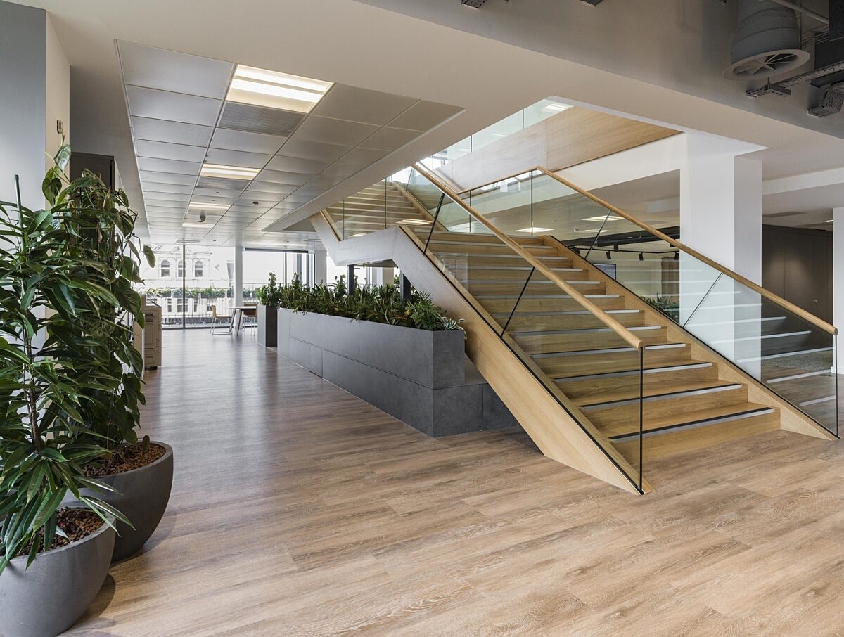 Office with wooden staircase to reduce CO2e
