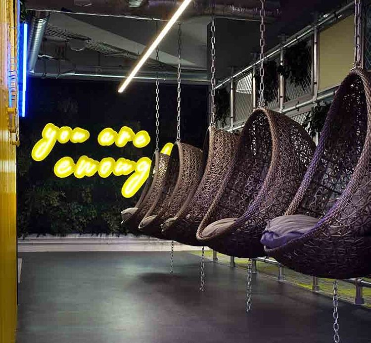 Hanging wicker furniture for office wellbeing