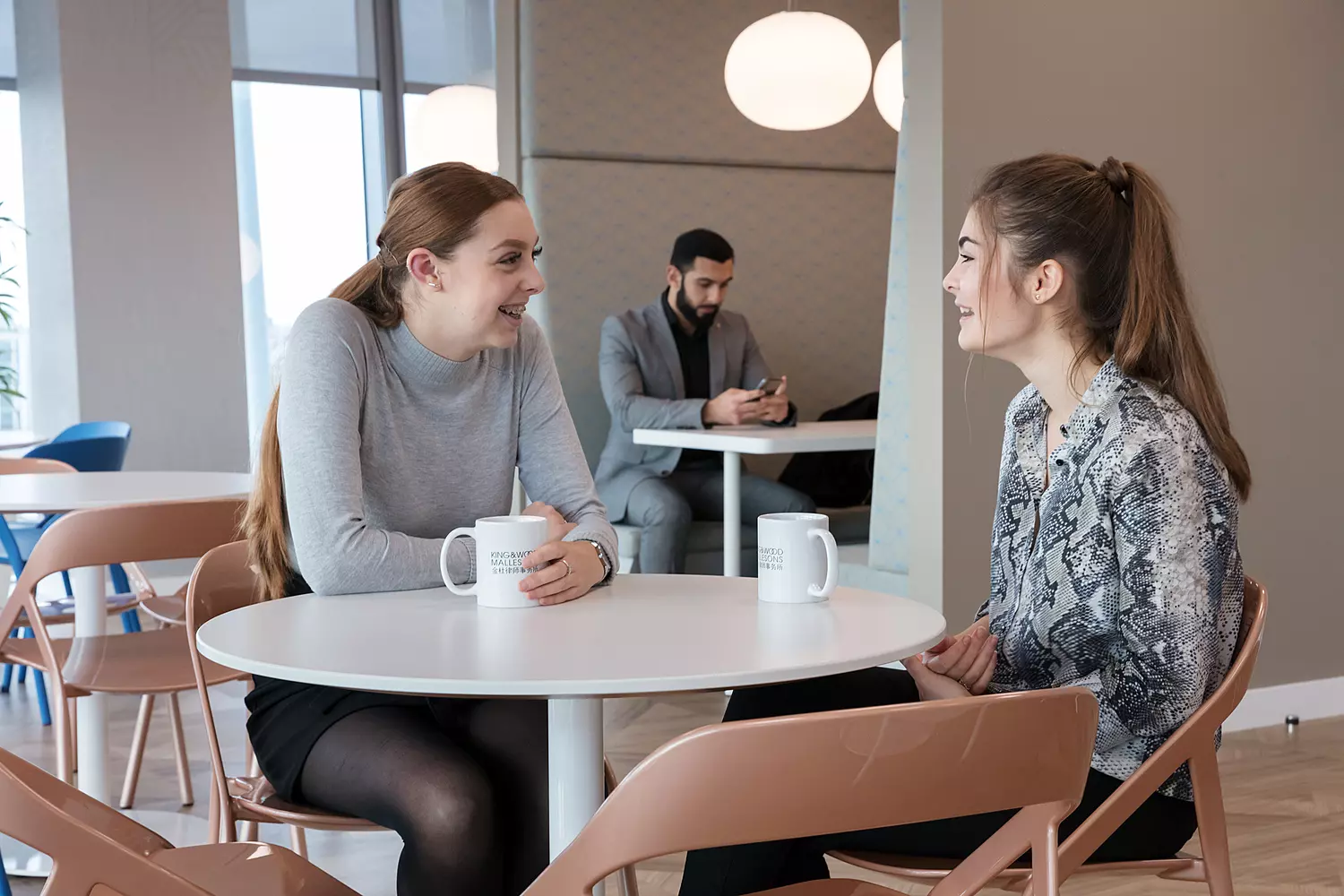 Collaboration in Three's office breakout space