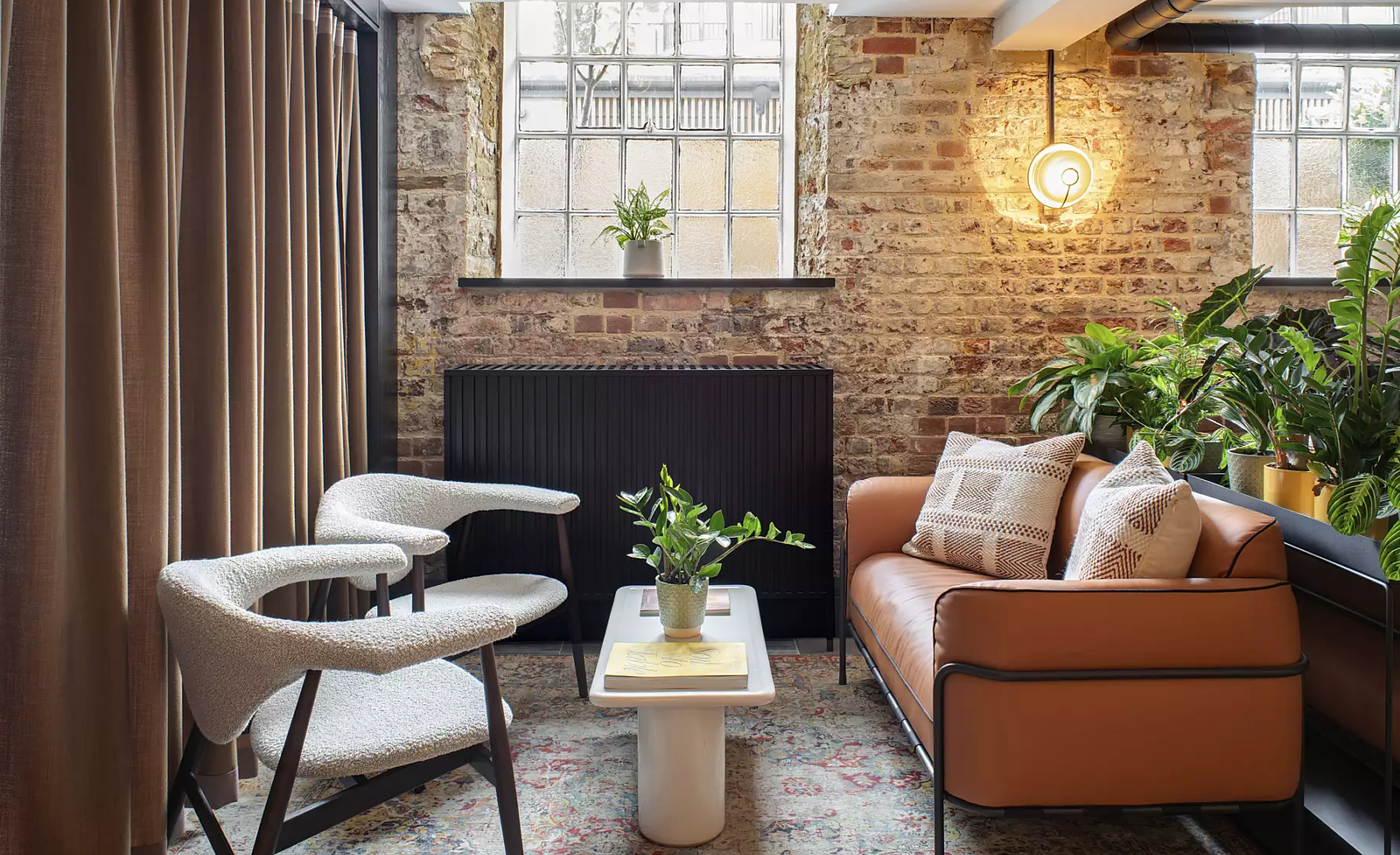 GPE Woolyard's trendy office design, exposed brick and soft furnishings