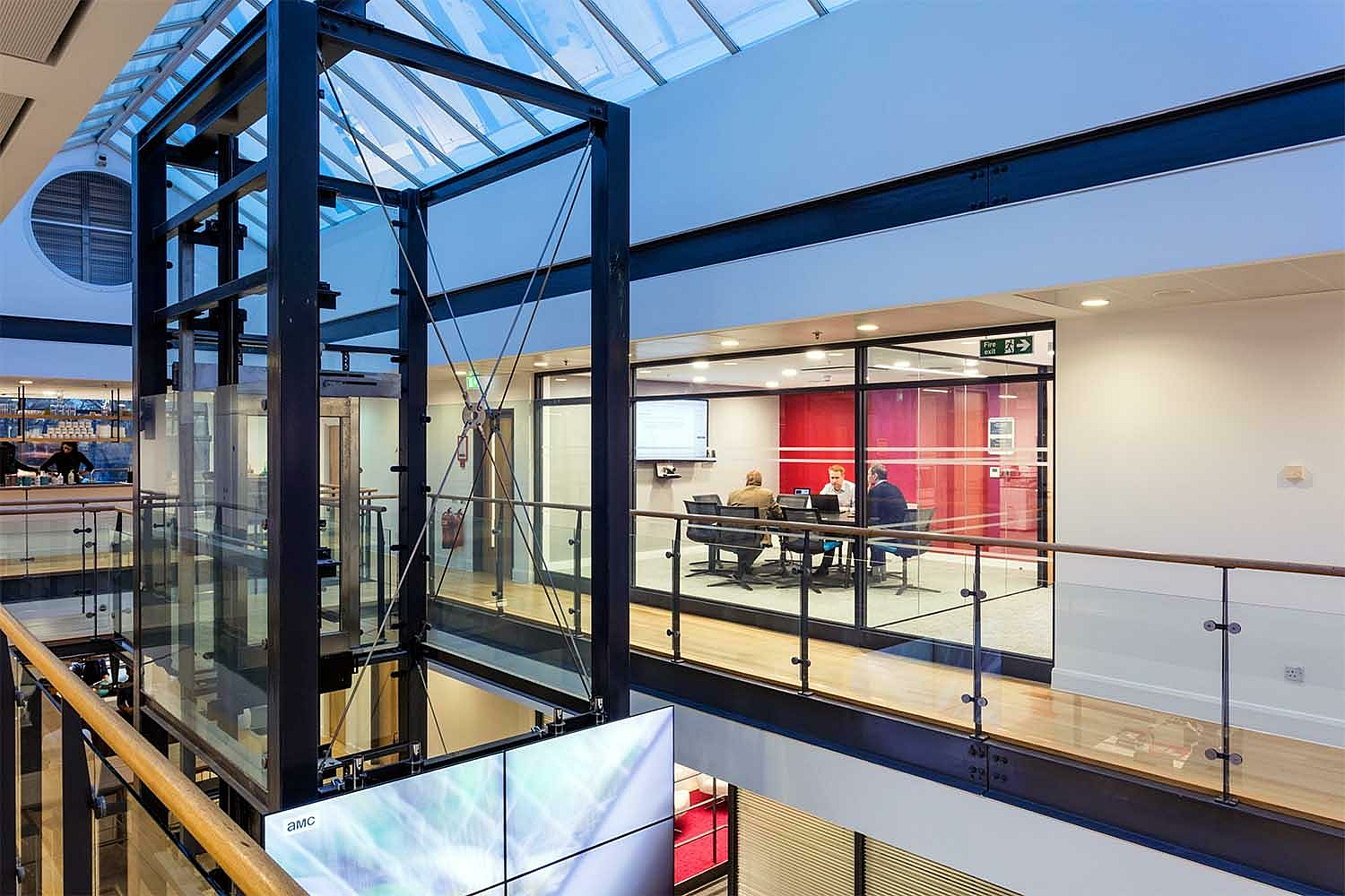 Office atrium letting in natural light for wellbeing