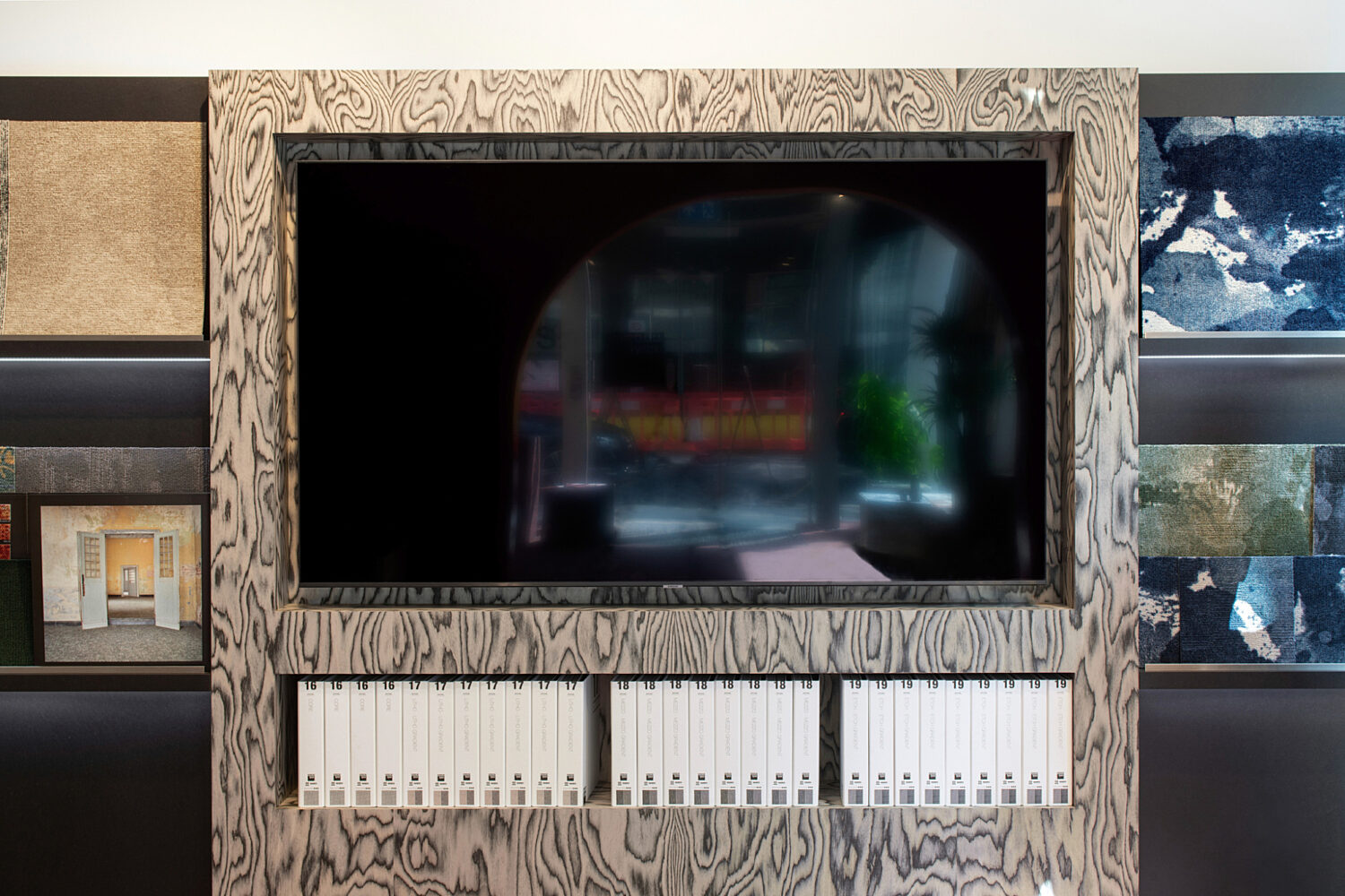 Wall mounted TV with timber surround at Modulyss