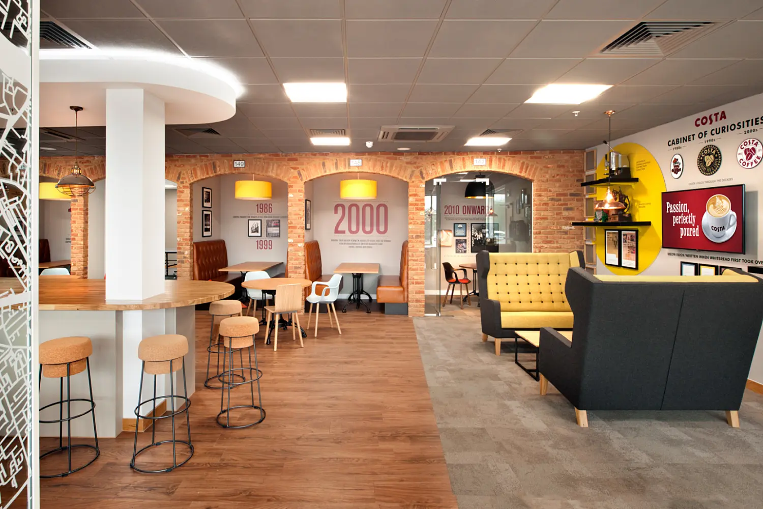 Booth seating and company branding at Costas Basildon office