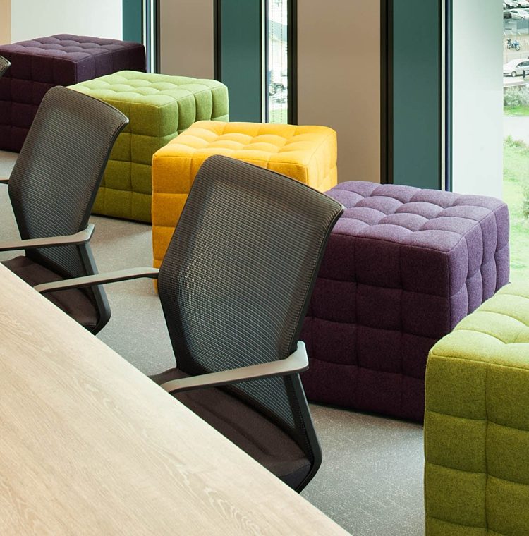Livability boardroom design with pouffes