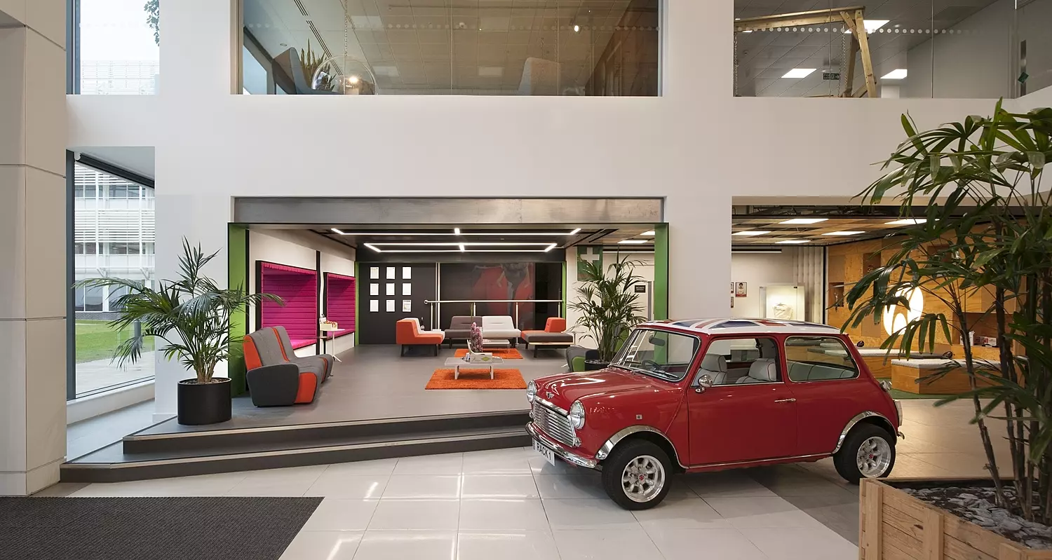 Red classic mini in office reception