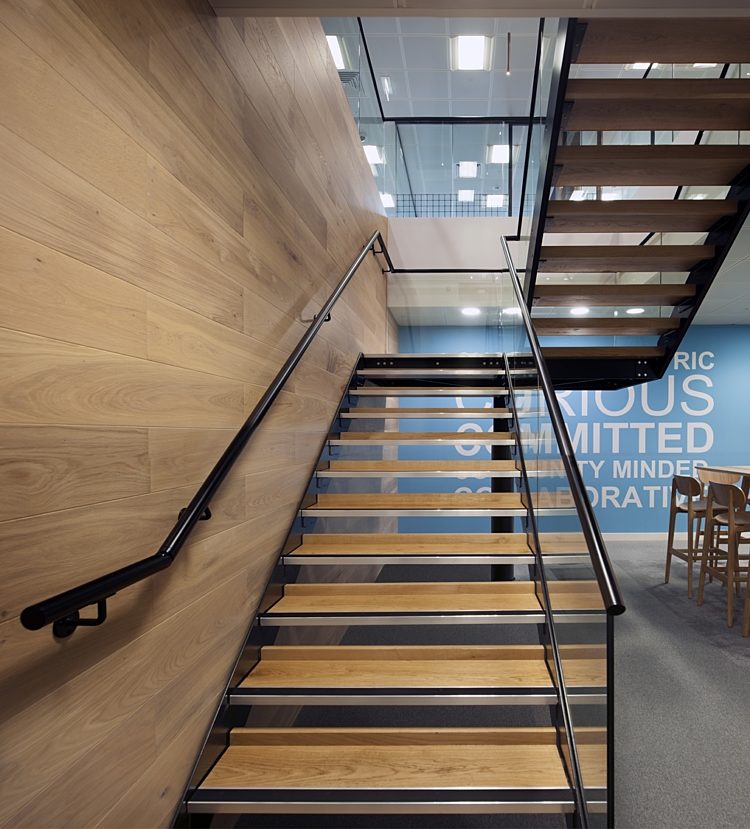 Riverbed's wood and metal staircase in modern office design