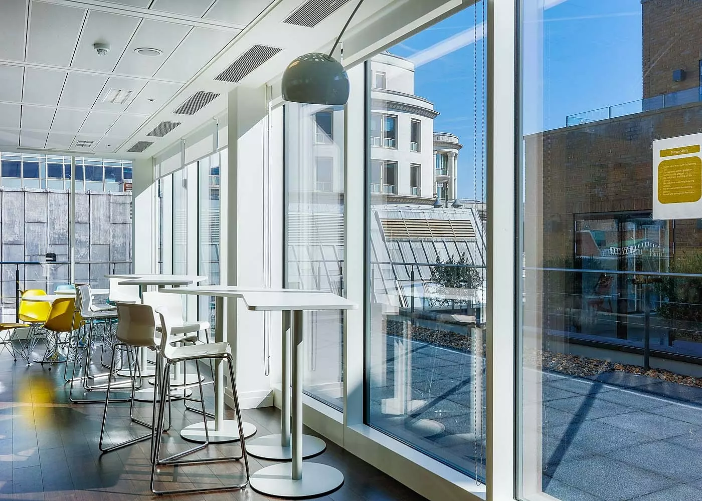 Office breakout space flooded with natural light